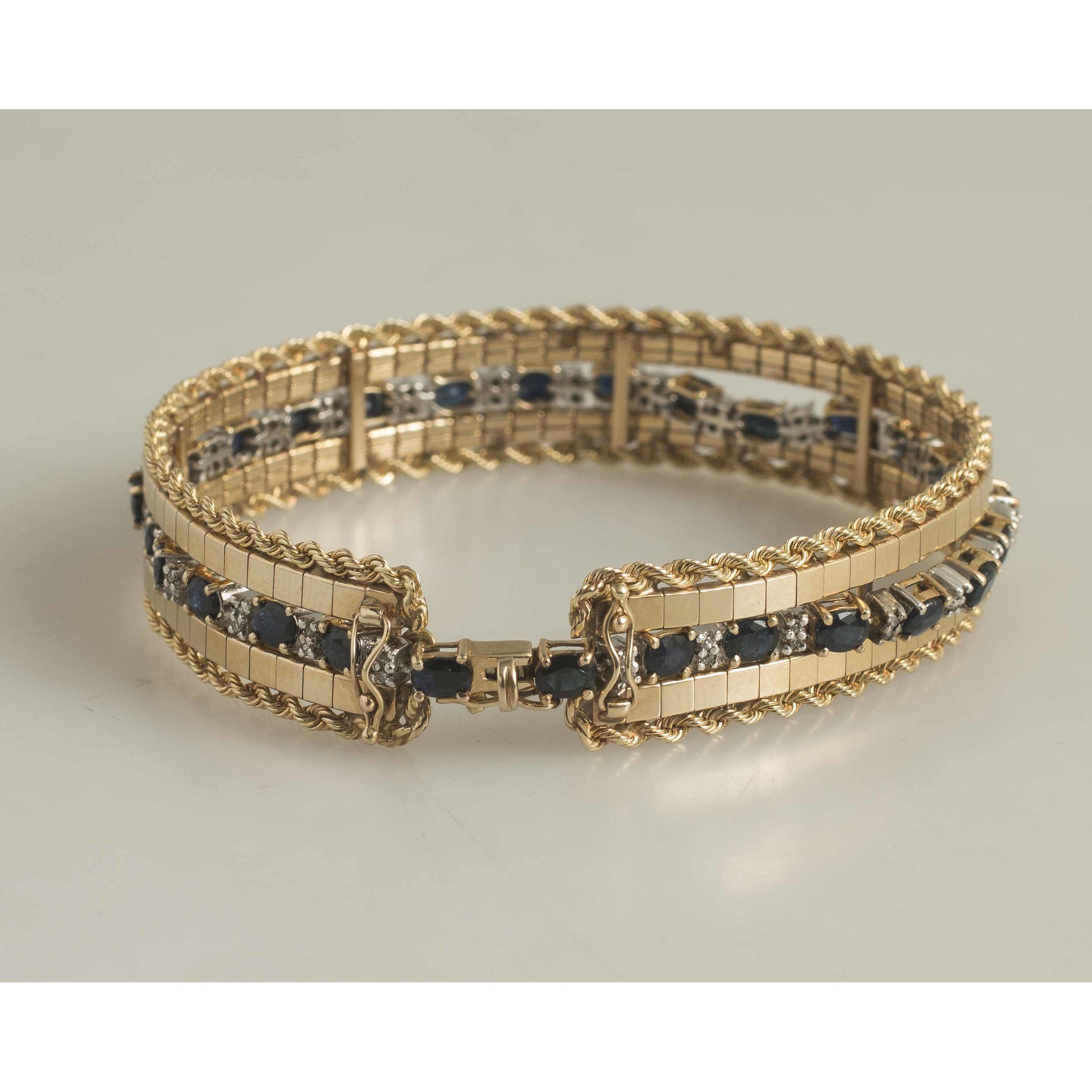 Sapphire Diamond Bracelet & 14k Gold Jacket Witherell's Auction House