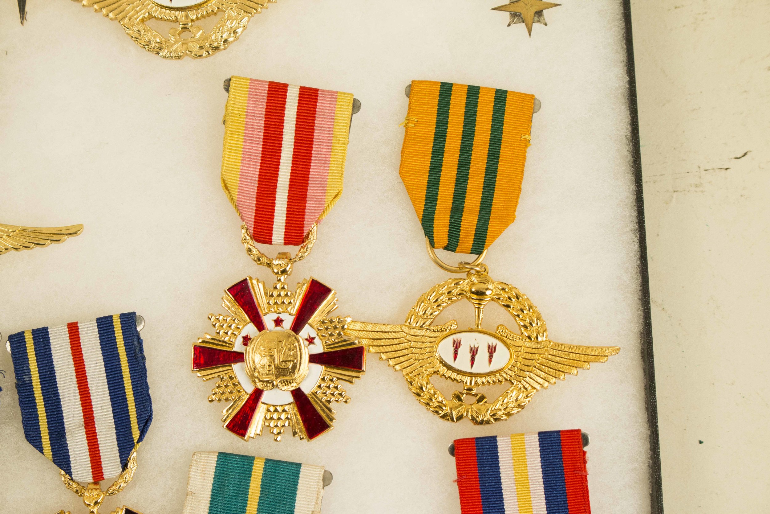 US Wings, Medals, and Badges, along with a number of foreign Orders