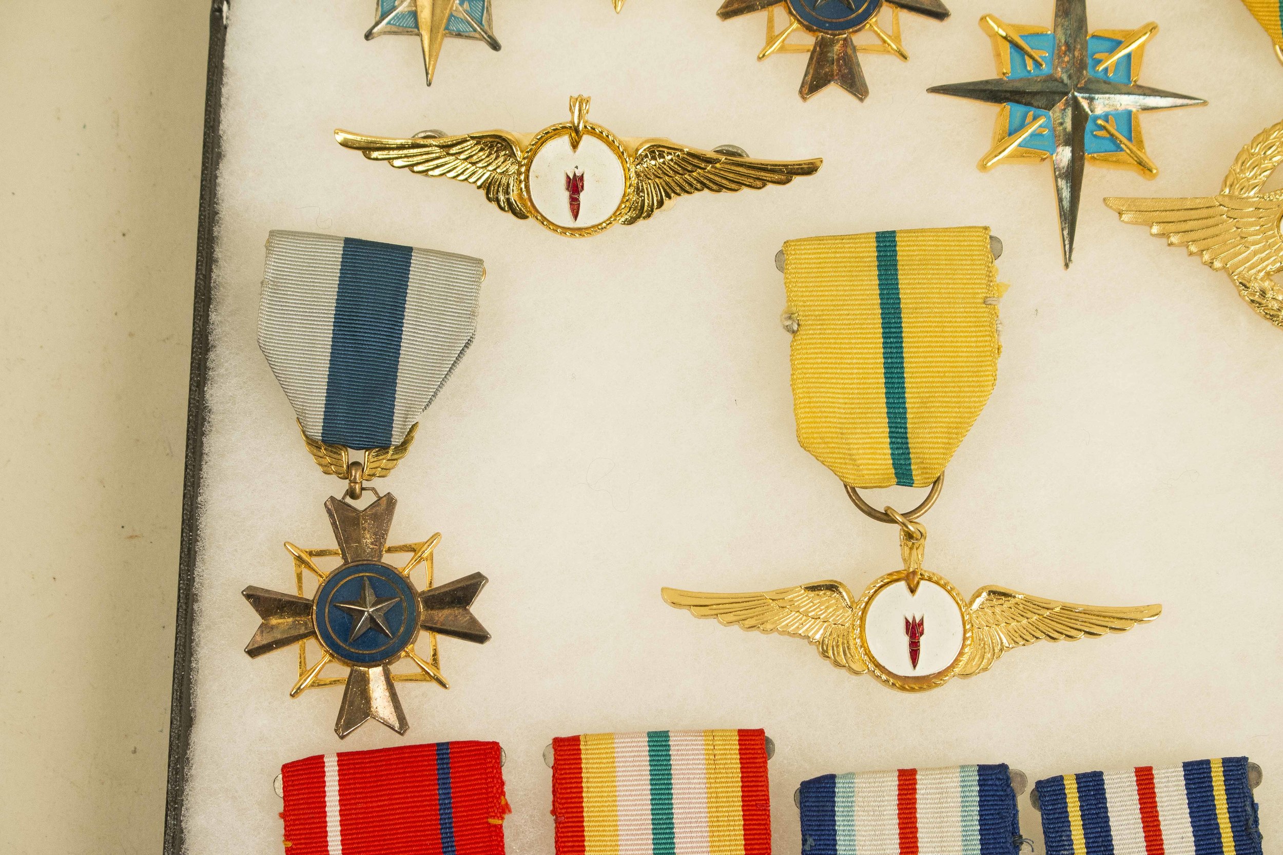 US Wings, Medals, and Badges, along with a number of foreign Orders
