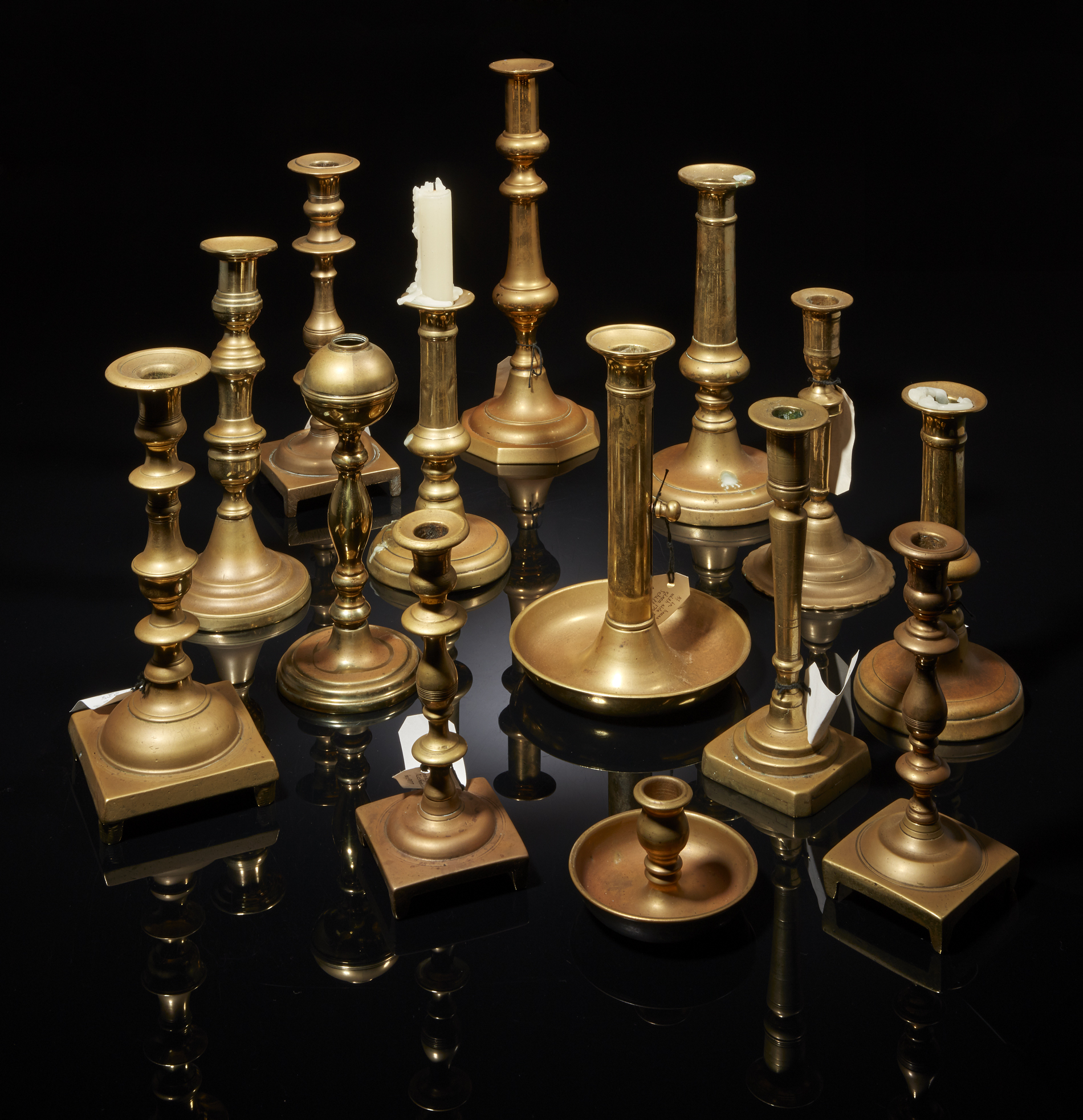 Fourteen Assorted Brass Candlesticks Witherell's Auction House