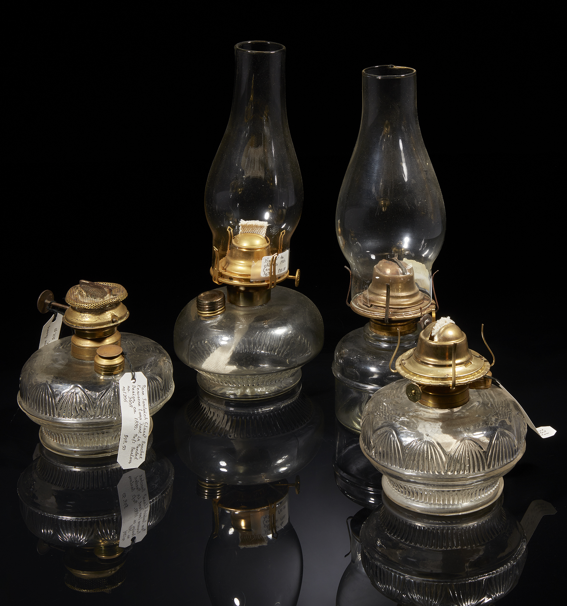 Four Glass Kerosene Lamps Witherell's Auction House