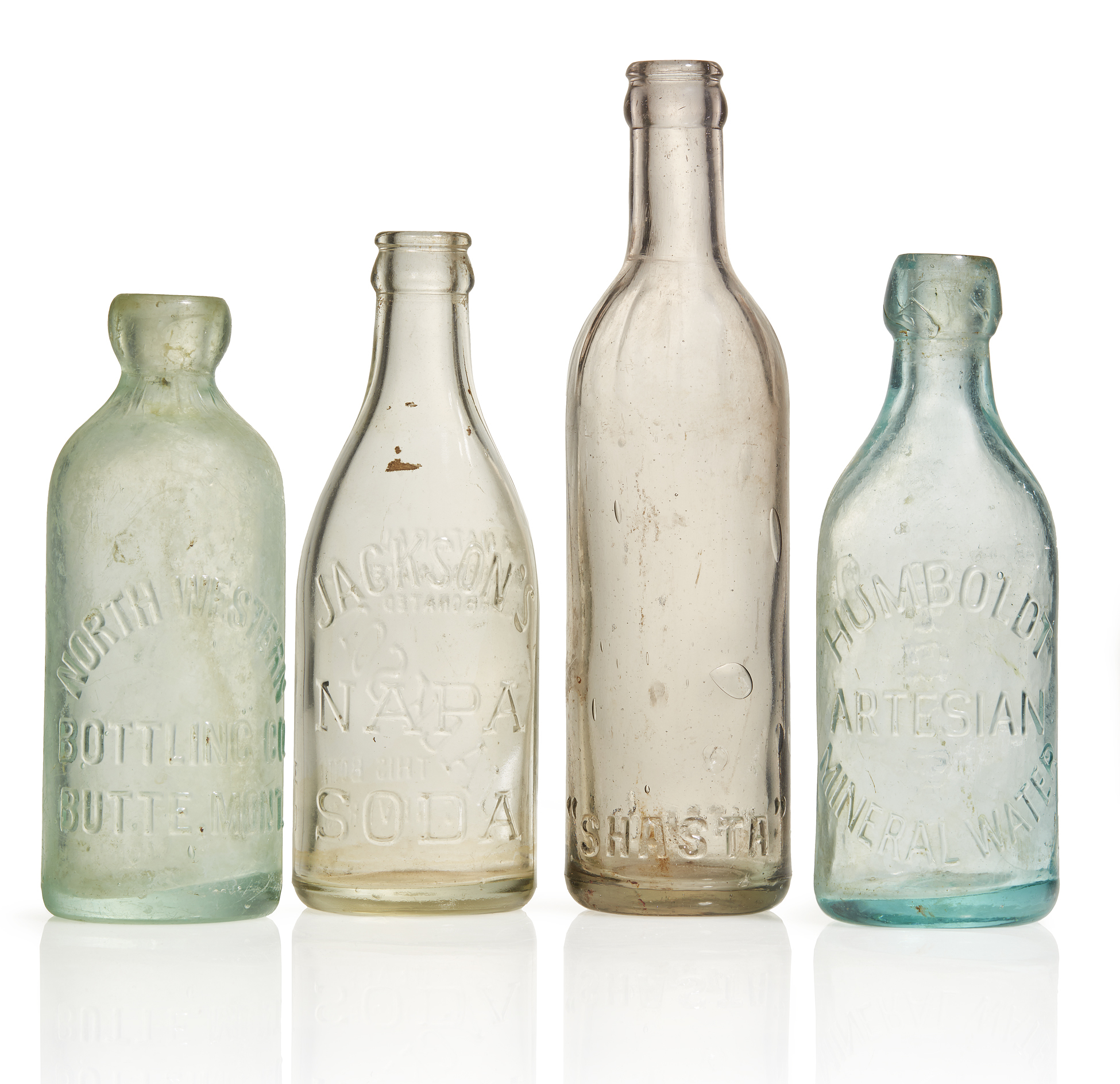 Four Western Soda Bottles Witherell's Auction House