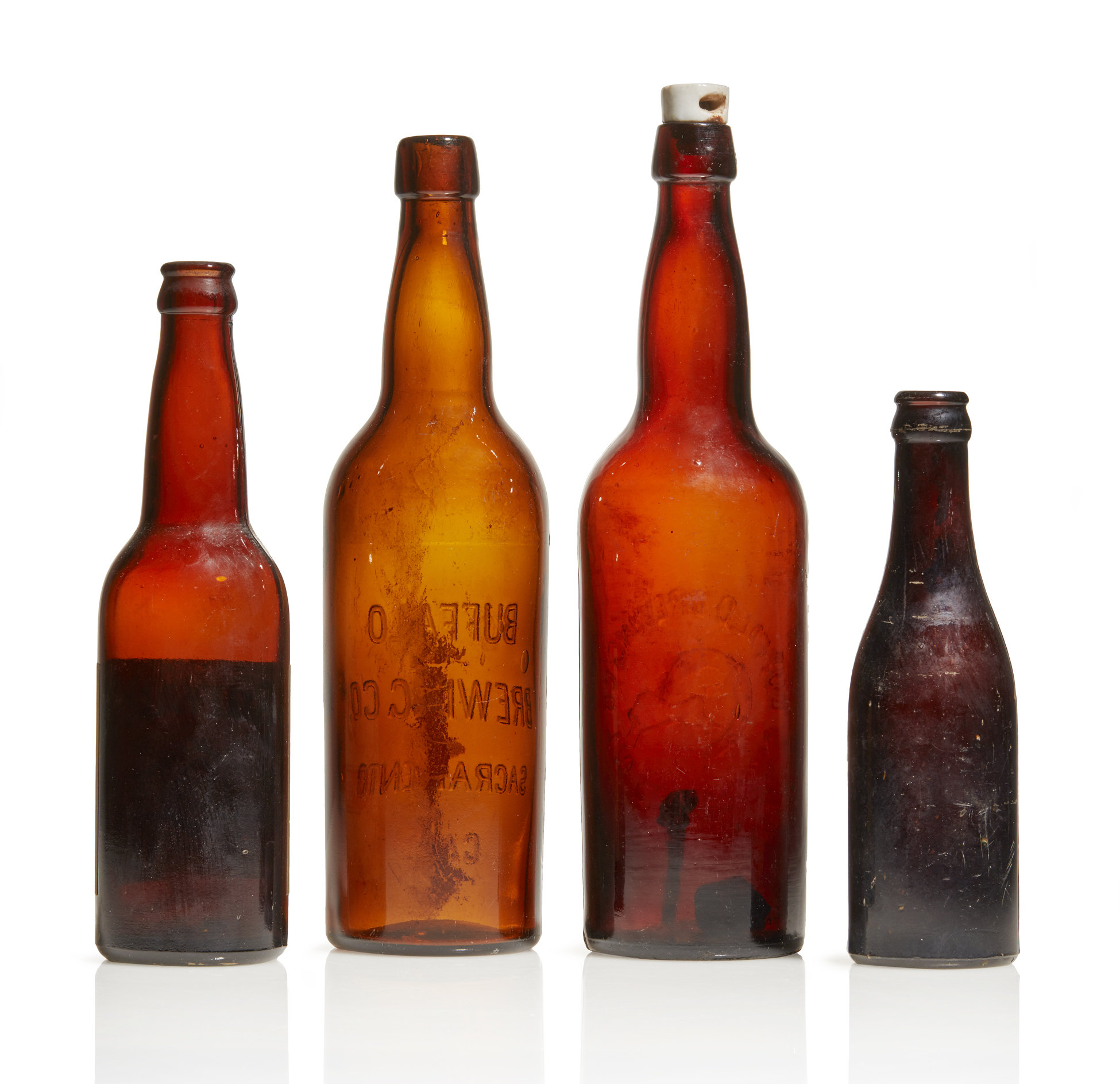 Four Buffalo Brewing Bottles Witherell's Auction House