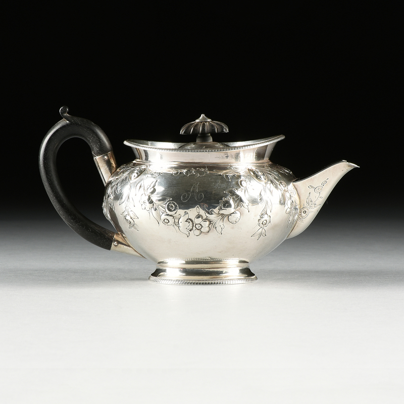A ROBERT GARRARD STERLING TEAPOT AND GORHAM TEA STRAINER, ENGLISH