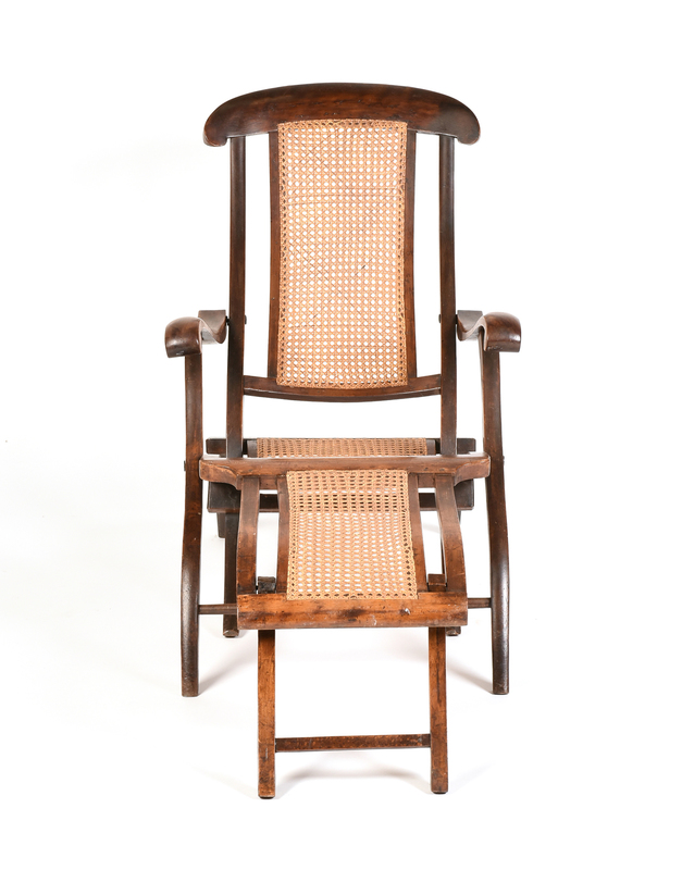 AN ANTIQUE ENGLISH CANED WALNUT FOLDING LOUNGE CHAIR, INITIALED W.B